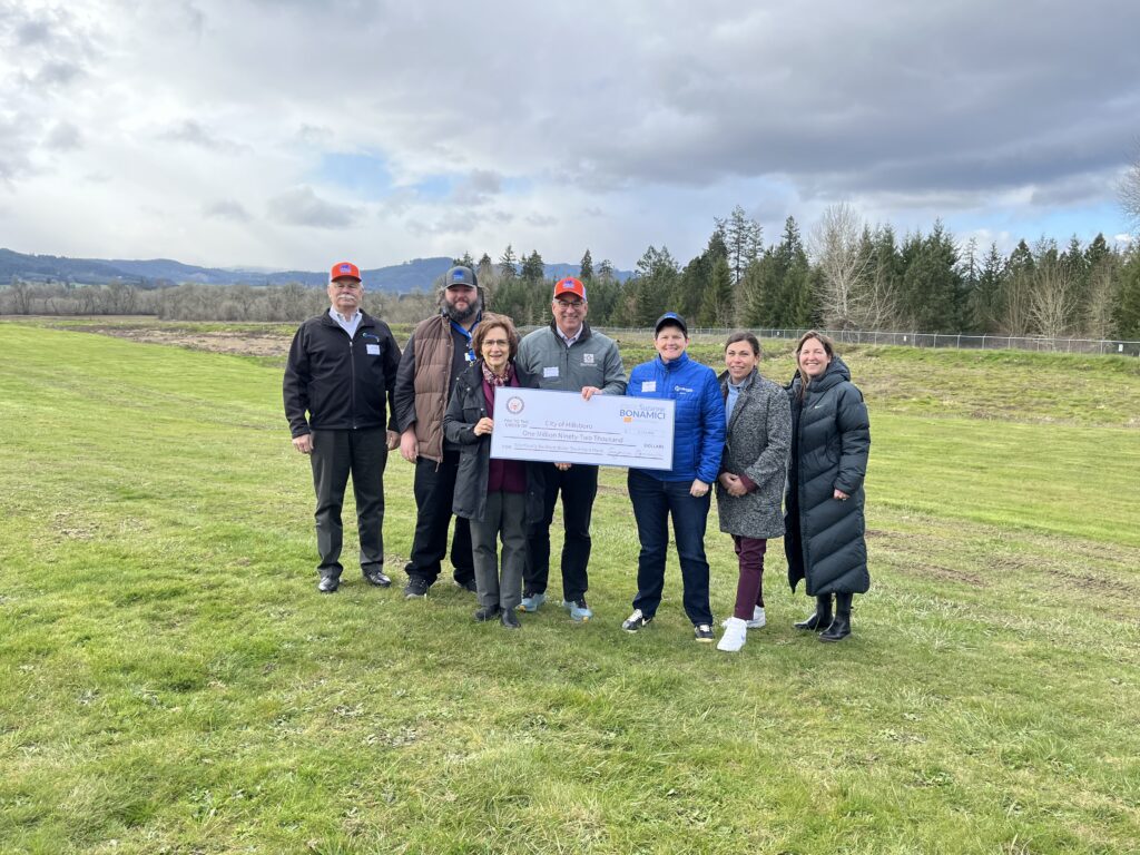 JWC Commissioners and Mayors posing with check.