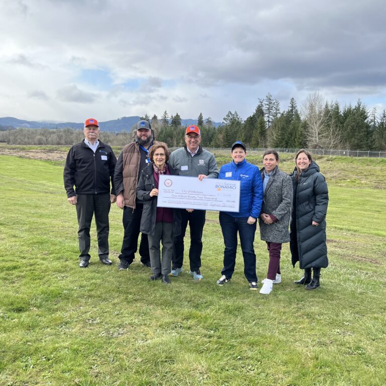 JWC Commissioners and Mayors posing with check.